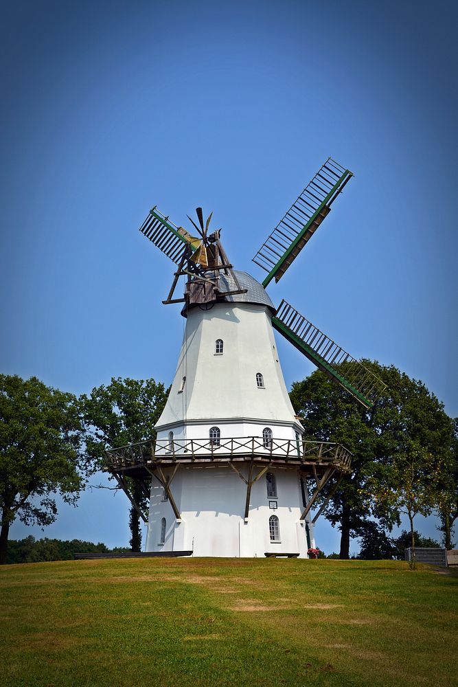 Traditional windmill in countryside. Free public domain CC0 image.