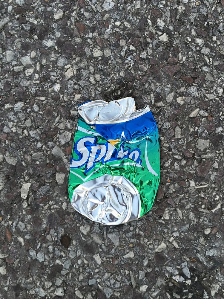 Smashed Sprite tin can, location unknown, date unknown