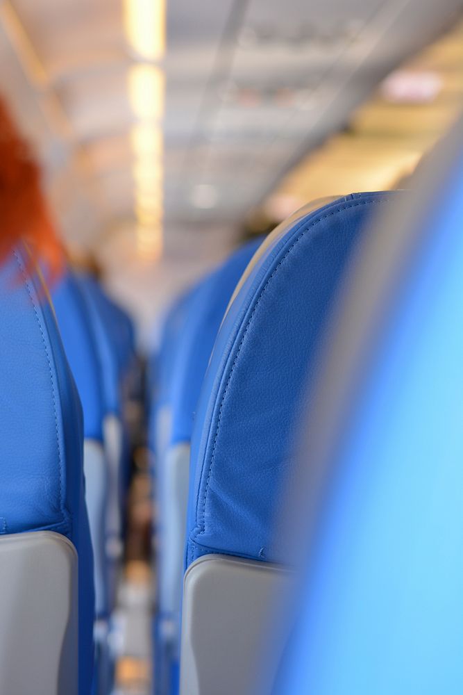 Passenger economy seats inside of a commercial plane. Free public domain CC0 photo