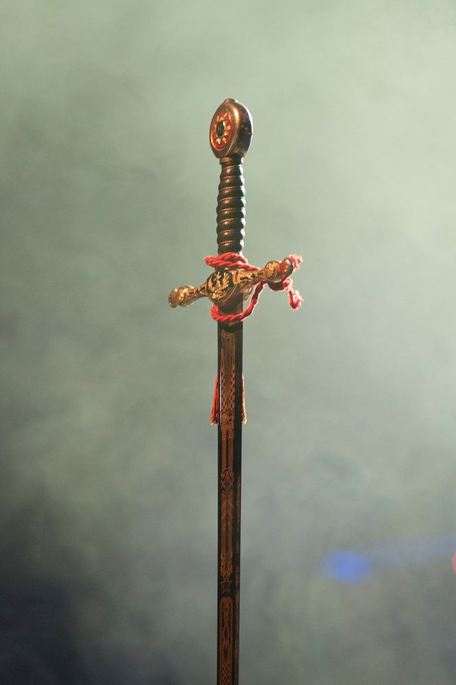 Sword with smoke background. Free public domain CC0 image.