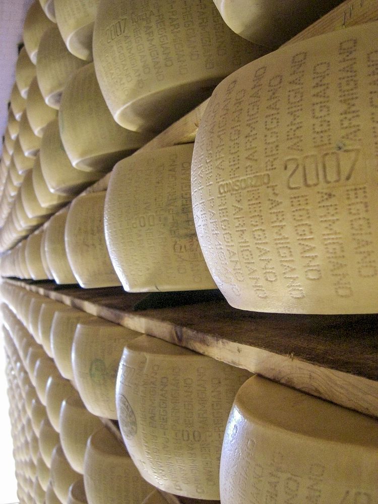 Parmigiano Reggiano cheese storage. Free public domain CC0 image.