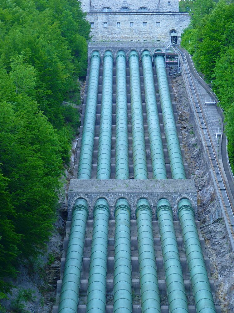 Water pipes in hydroelectric power station. Free public domain CC0 image.