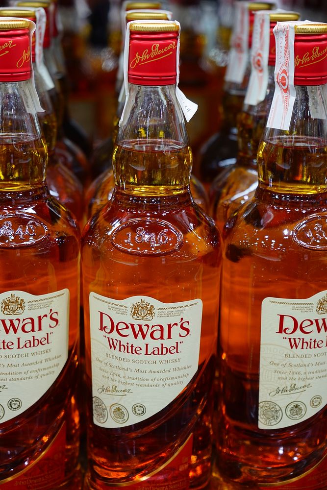 Dewar's white label, whiskey alcohol bottle, location unknown, date unknown