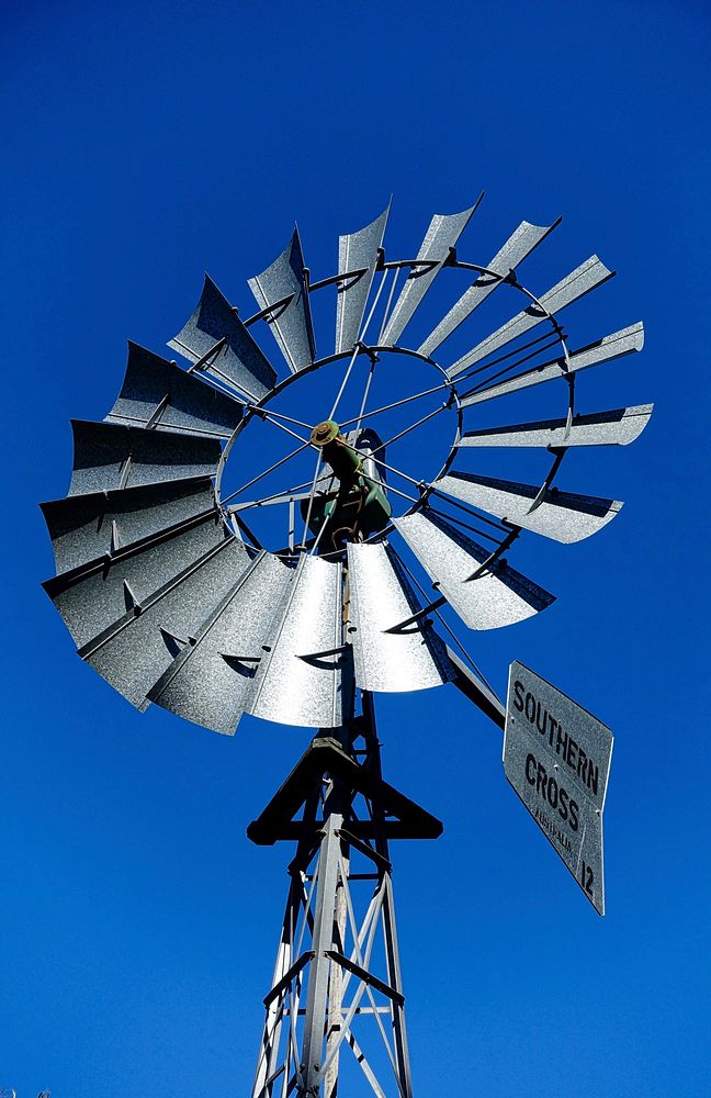 Steel windmill for alternative energy. Free public domain CC0 photo.