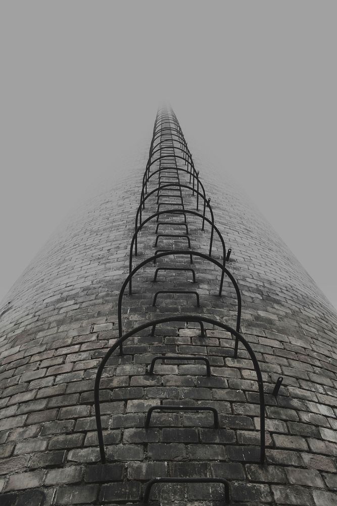 Brick tower's ladder. Free public domain CC0 photo.