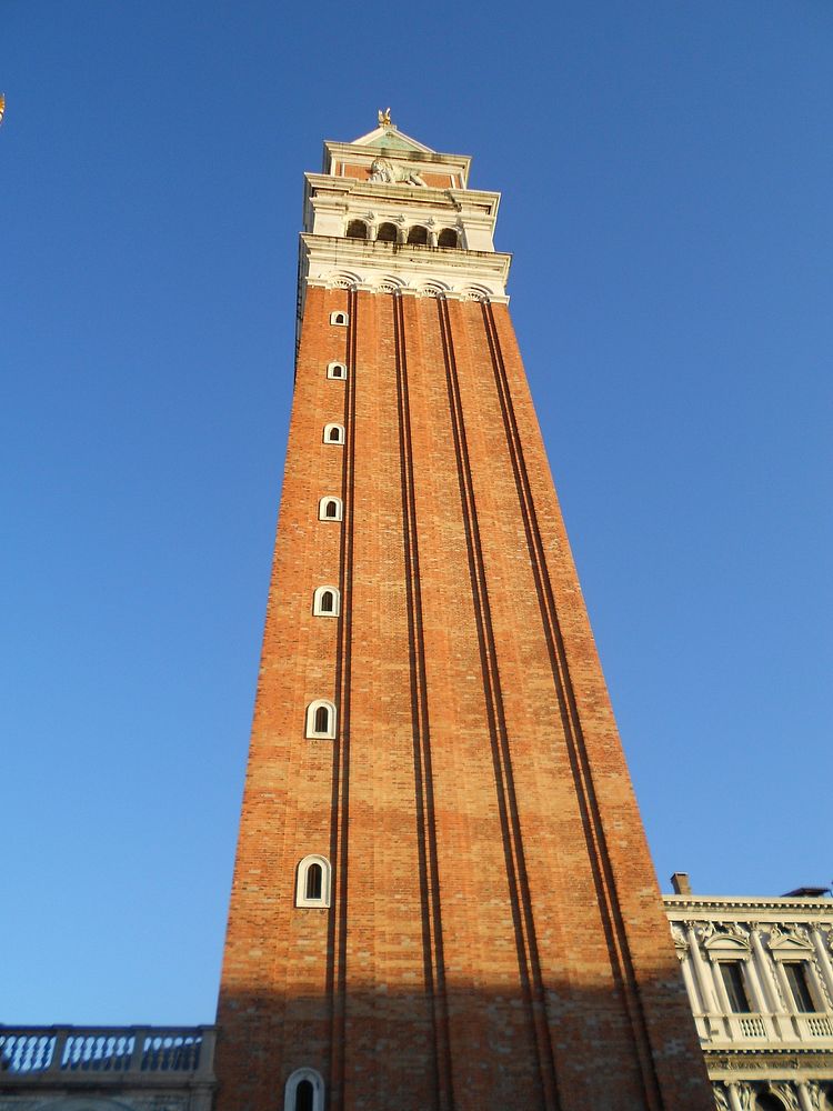 Closeup on tall exterior of building. Free public domain CC0 photo.