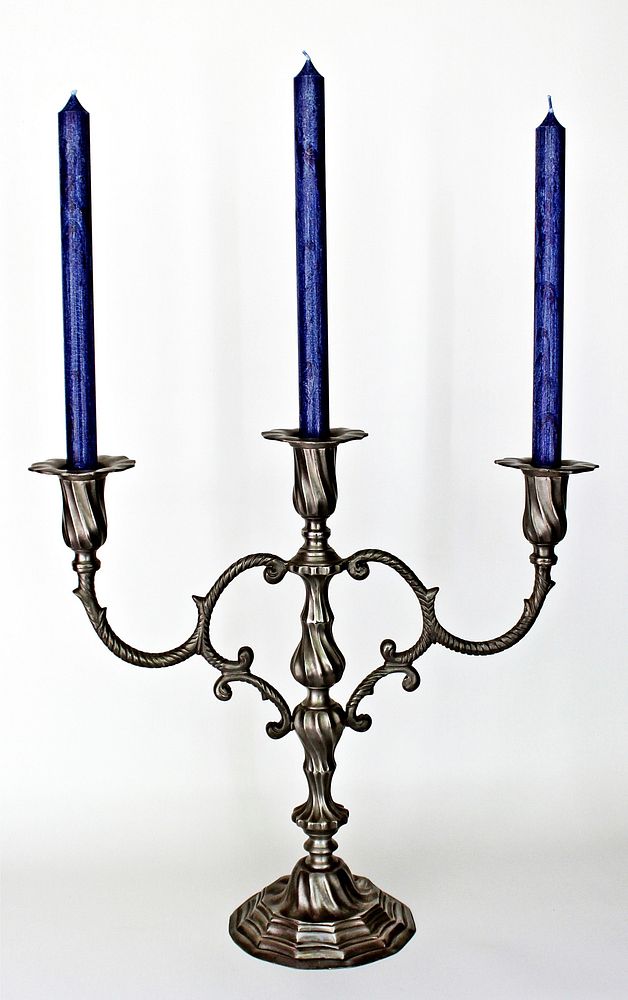 Free unlit candles on table chandelier public domain CC0 photo.