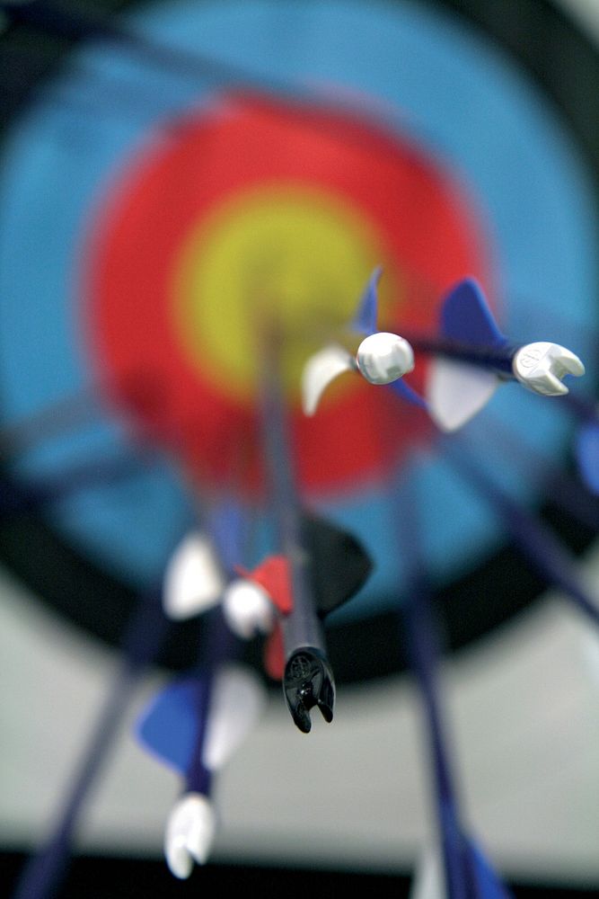 Free closeup on archery target with arrows image, public domain sport CC0 photo.