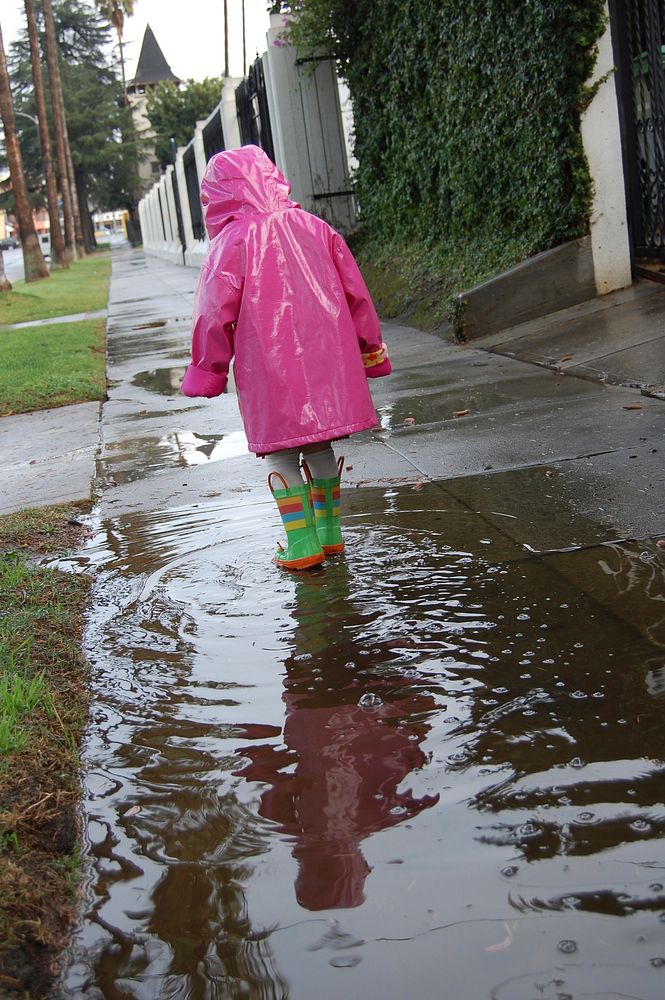 Free kid in a rainy day image, public domain CC0 photo.