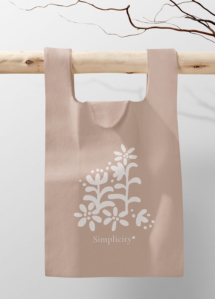 Canvas tote bag, beige printed floral graphic, realistic design