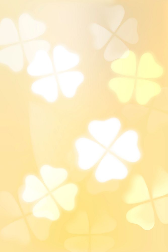 White clover leaf on yellow background bokeh light