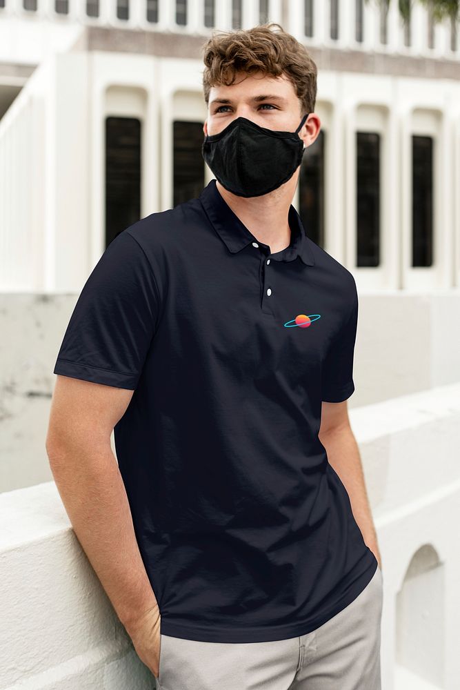 Man in black polo shirt, with face mask in public, the new normal lifestyle, summer time