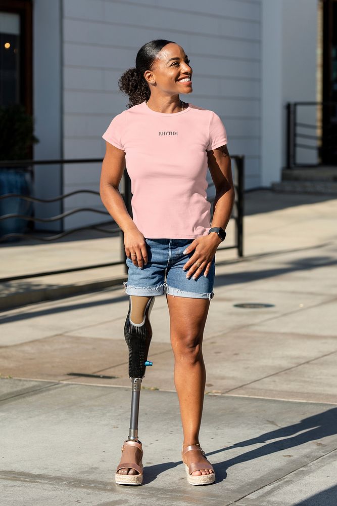 Happy African American amputee person wearing a prosthetic leg
