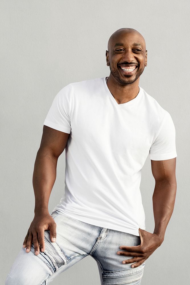 Men's casual clothing in white, smiling African American man