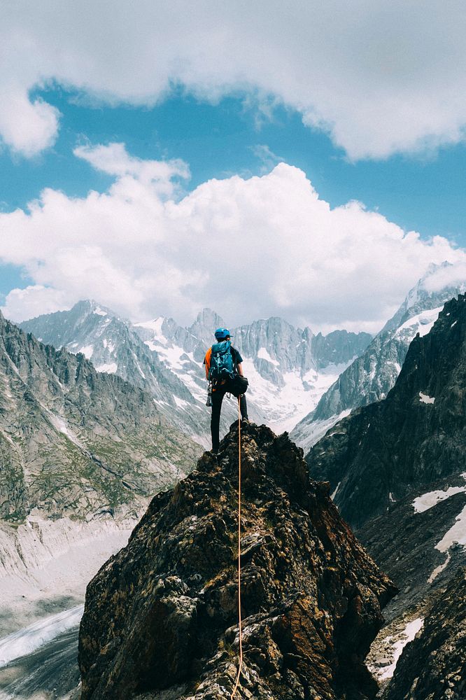 Backpacker at  Chamonix Alps summit in France