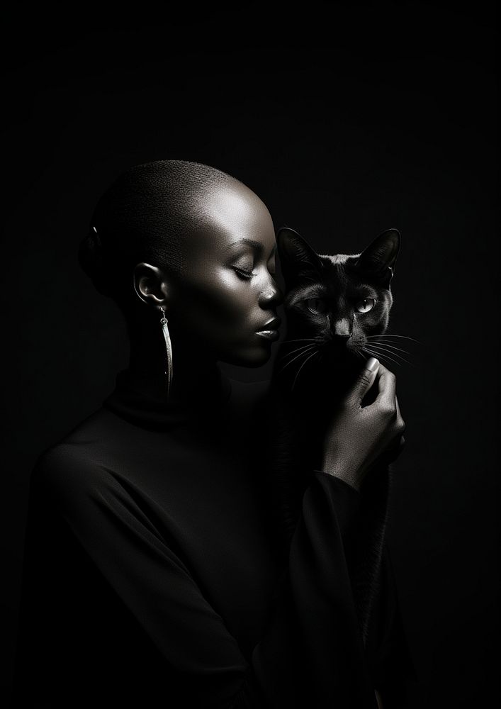 A portrait of an african woman looking at a cat photography mammal adult. AI generated Image by rawpixel.