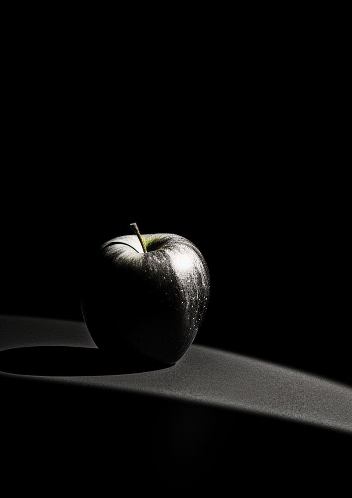 An apple with the strong shadow fruit black plant. AI generated Image by rawpixel.
