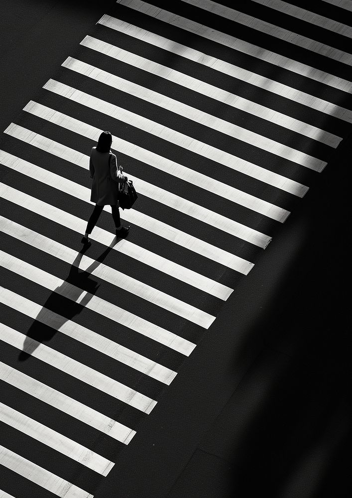 People walking across the zebra crossing street wearing worker uniform motion black white. AI generated Image by rawpixel.