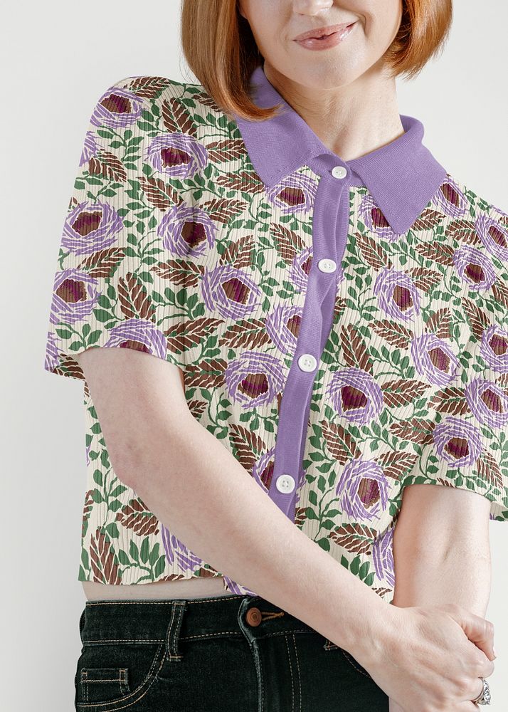 Ginger-haired woman in purple floral shirt