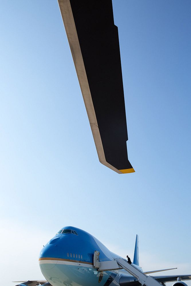 President Barack Obama boards Air Force One at Joint Base Andrews, Md., for departure en route to Buffalo, N.Y., Aug. 22…