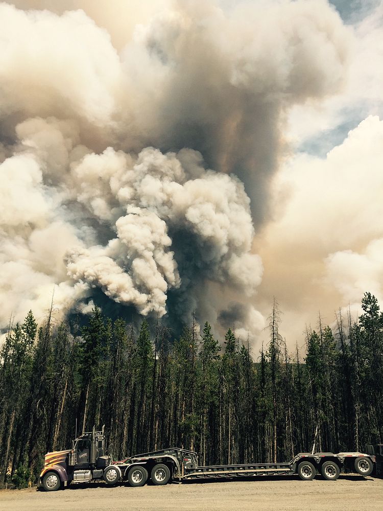 Rail Fire burning behind staged equipment, Wallowa Whitman and Malheur National Forest. Original public domain image from…