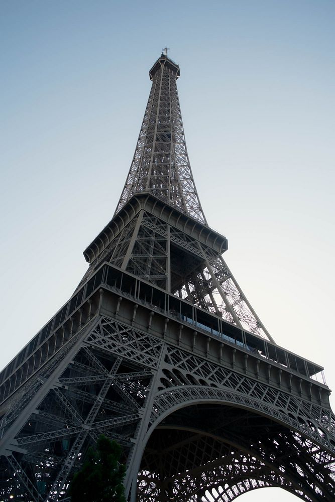 Low angle view of Eiffel Tower with clear blue sky as background - Paris, France