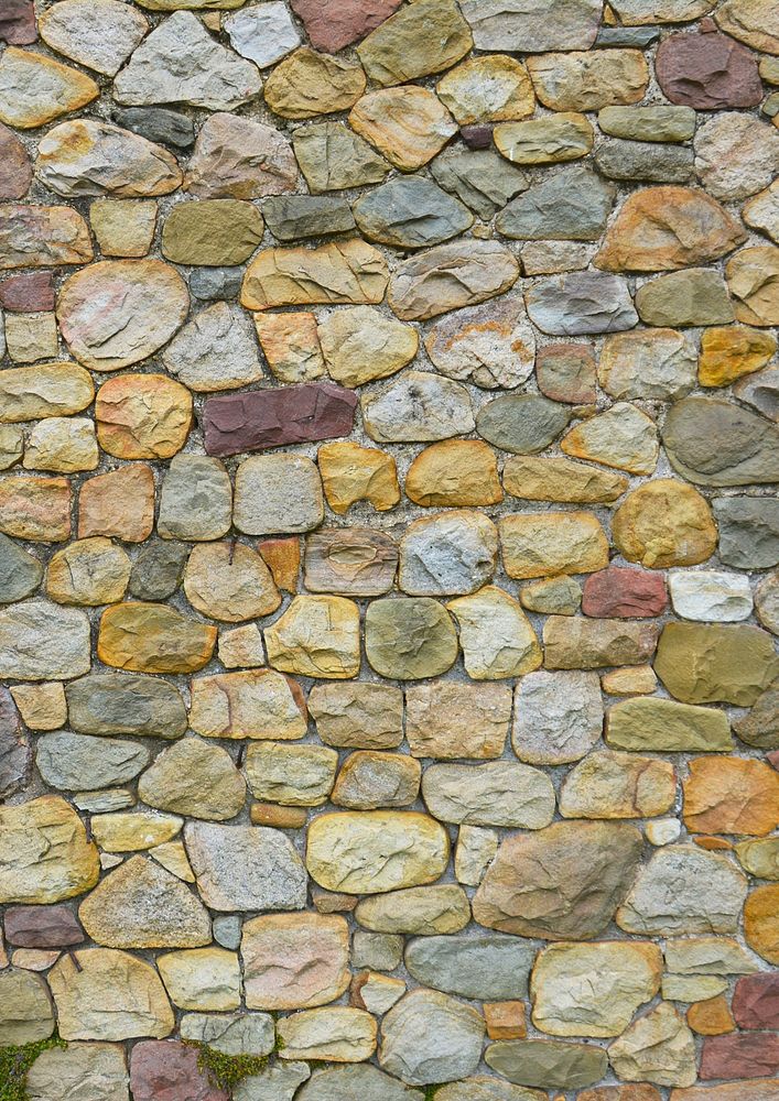 Cobblestones wall texture background, close up design