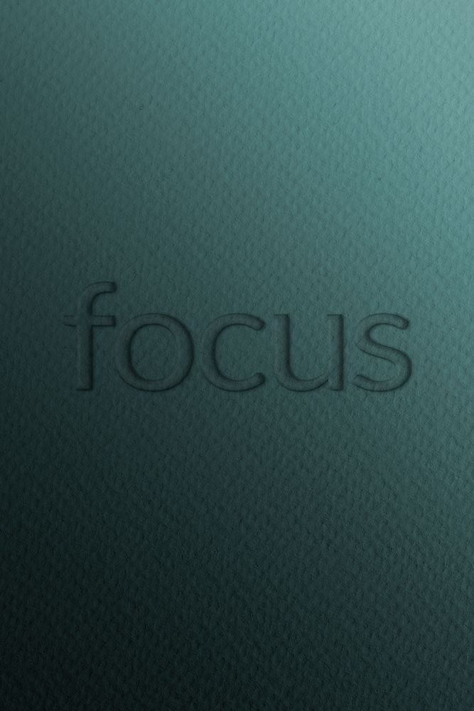 Focus emboss typography psd on paper texture