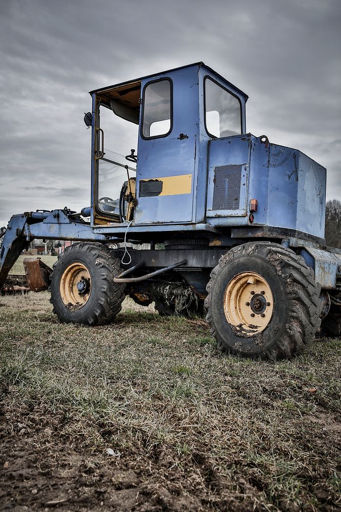 A blue vintage tractor