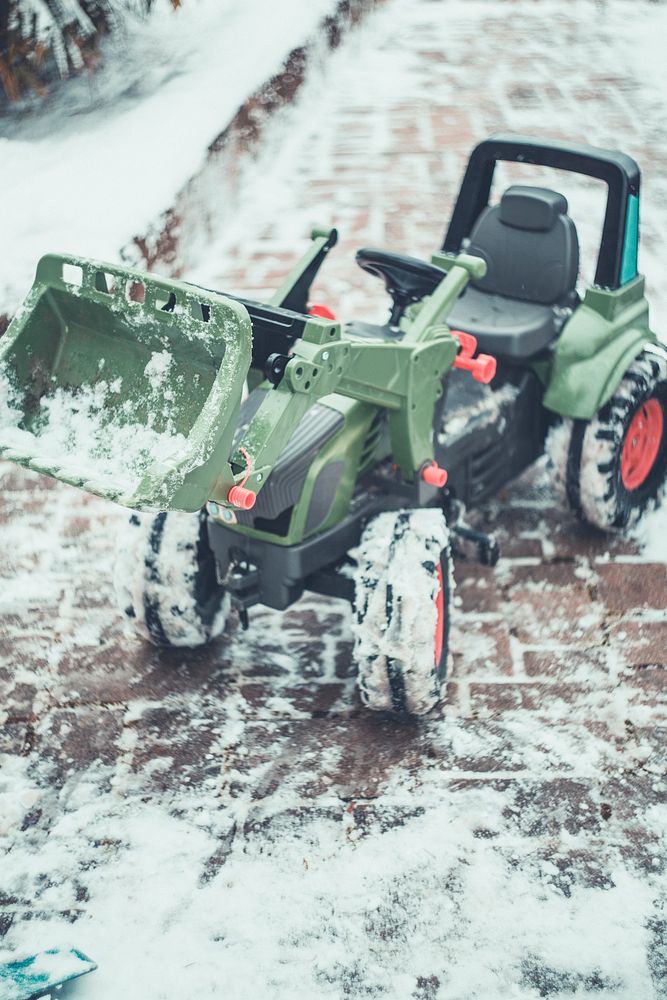 Toy tractor in the snow