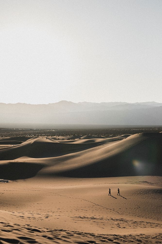Couple walking in the Death Valley in California, United States