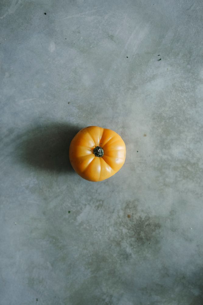 Fresh organic yellow heirloom tomato