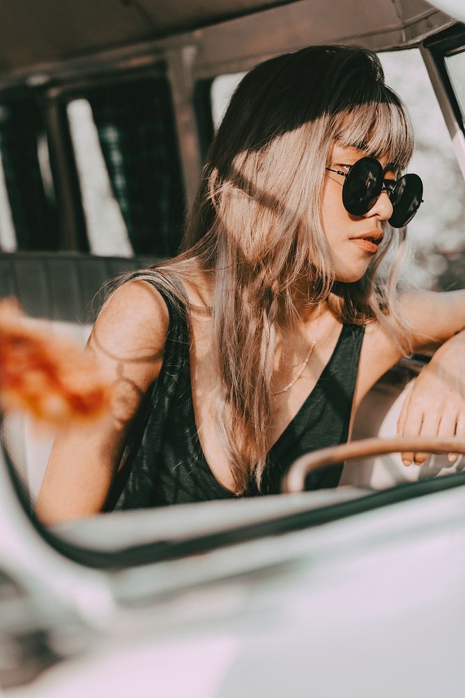 Boho woman road trip portrait in a minivan, travel HD photo