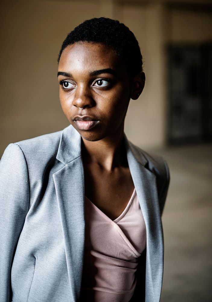 Thoughtful casual woman in blazer