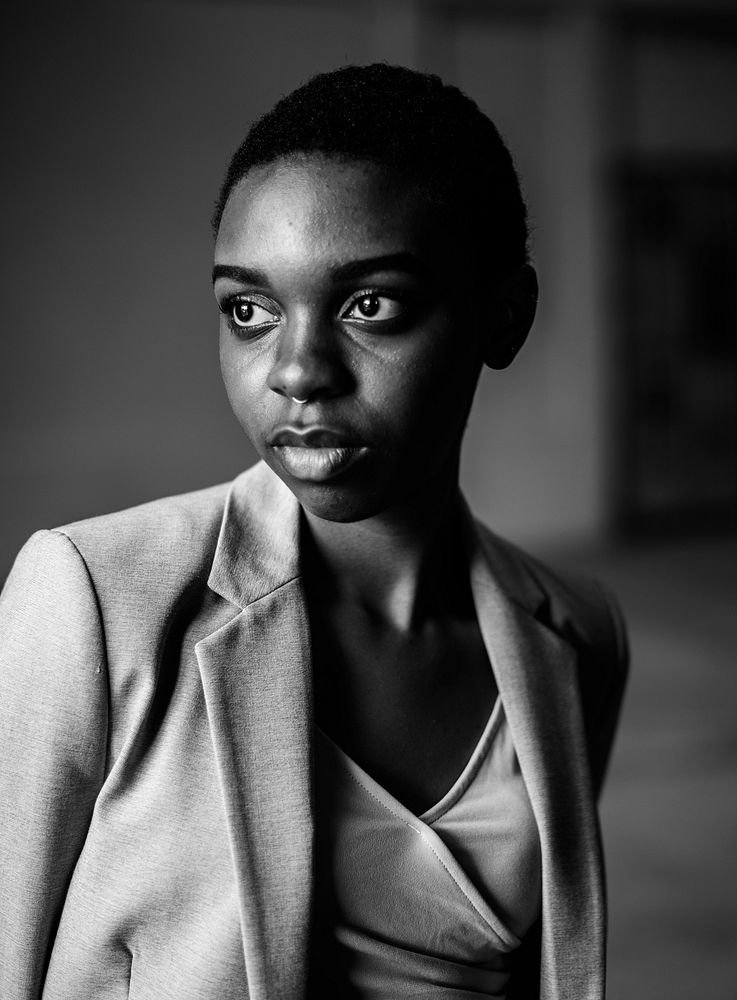 Thoughtful casual woman in blazer