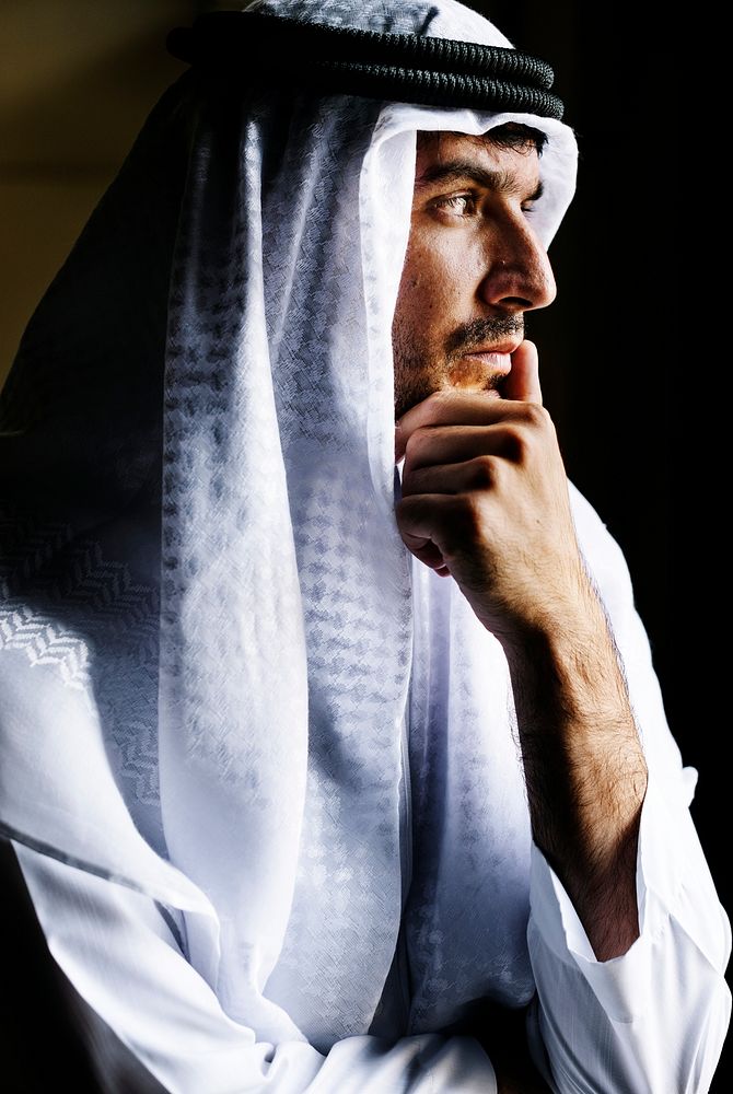 Portrait of a handsome Middle Eastern man thinking deeply