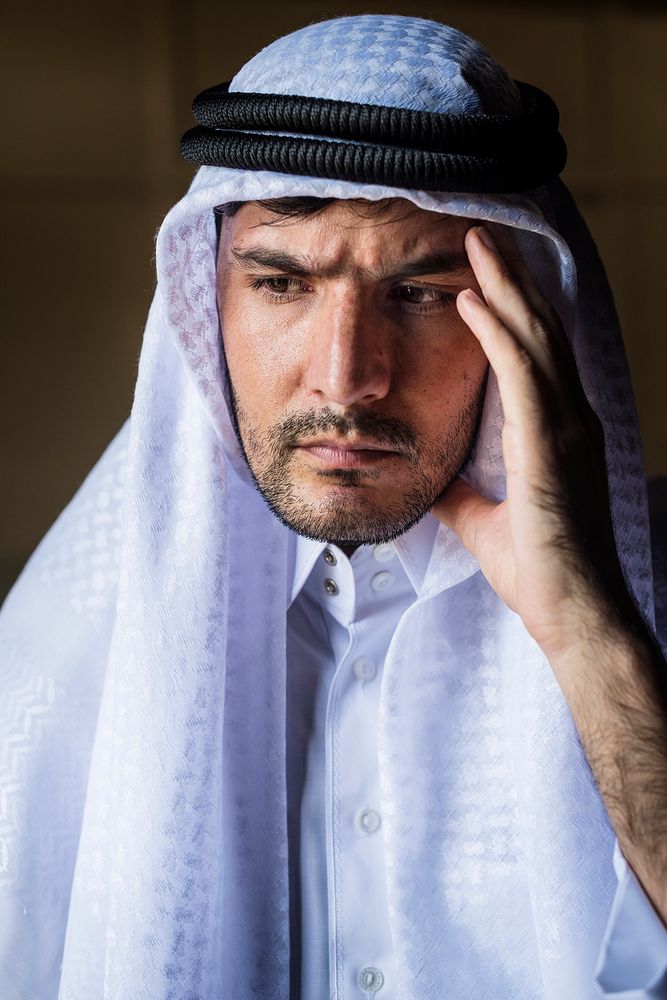 Arab man with thoughtful face expression
