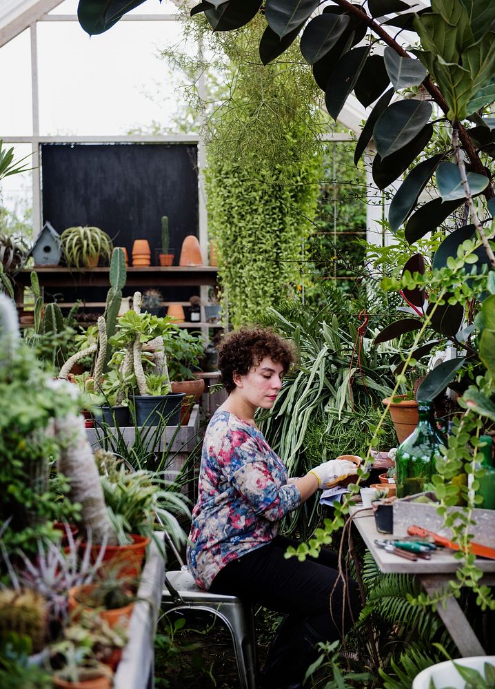 Woman working in a garden shop