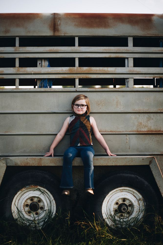 A young girl is having fun in the farm