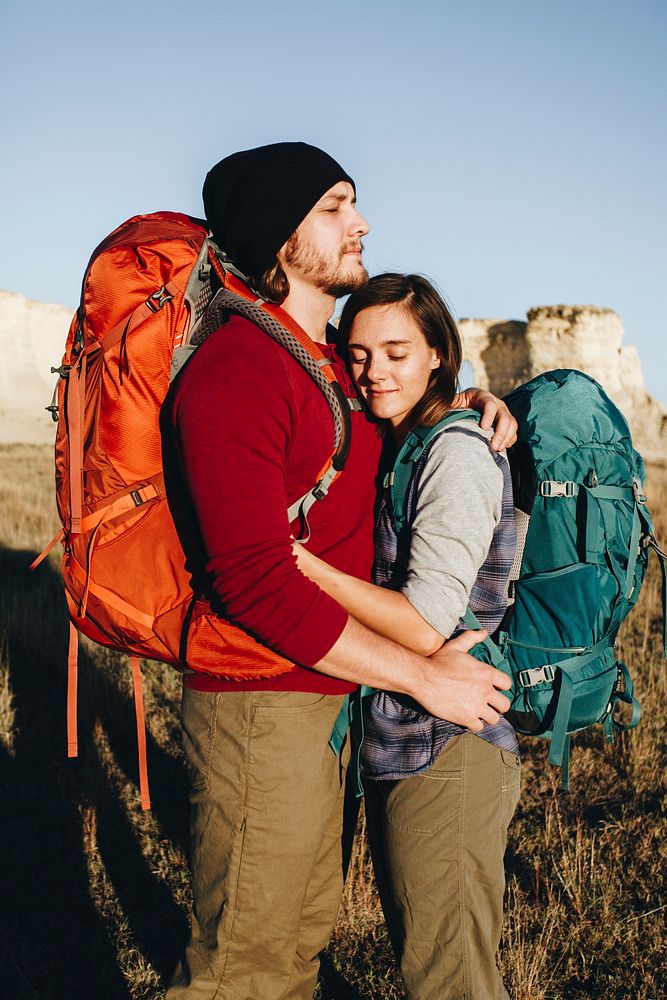 Couple hiking together in the wilderness