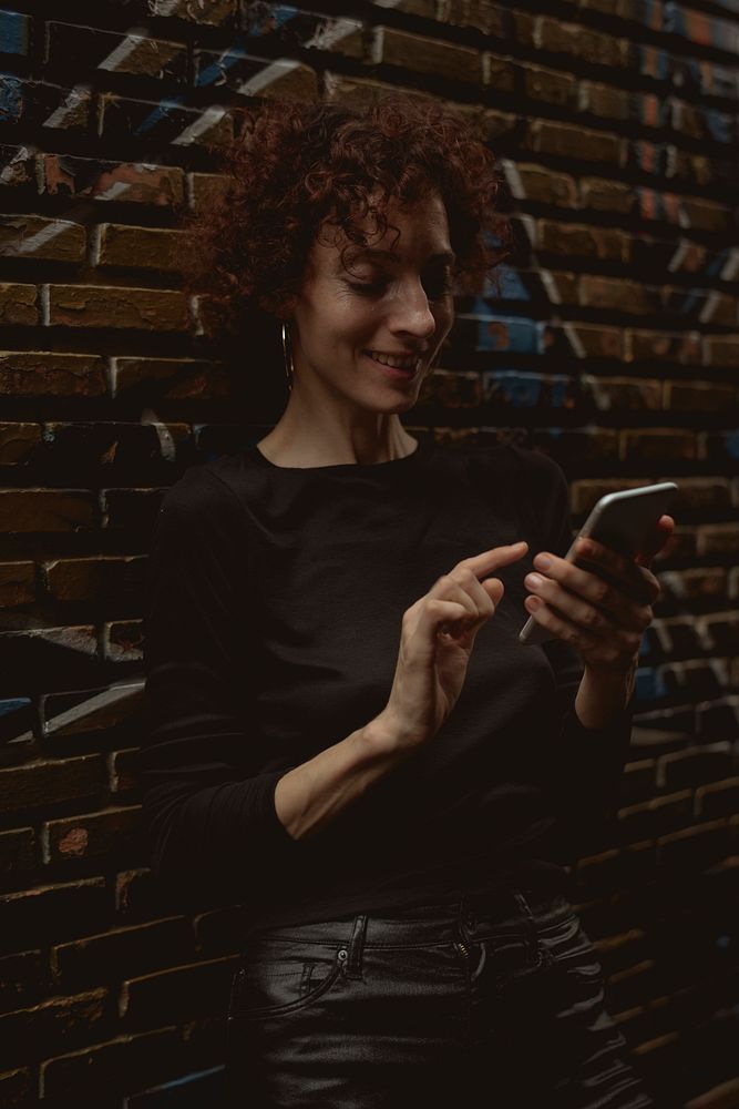 Caucasian woman using mobile phone
