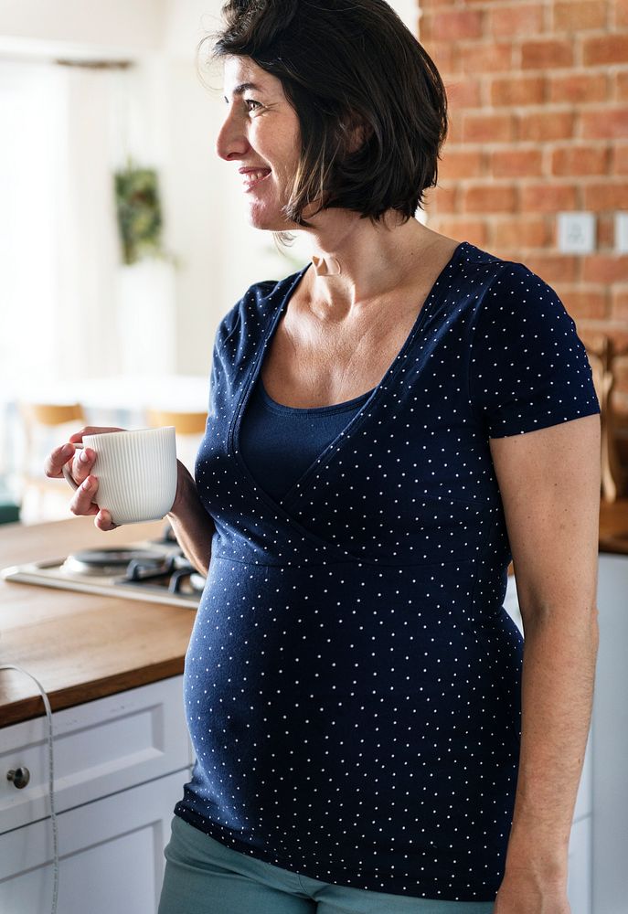 Pregnant woman drinking hot milk