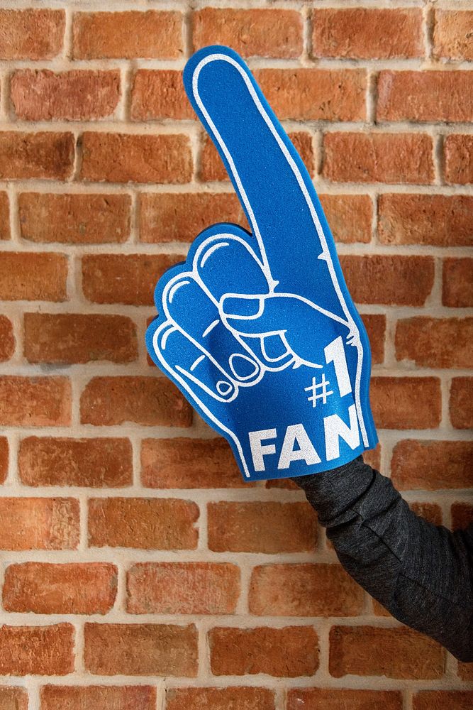 Man with sport number 1 fan glove