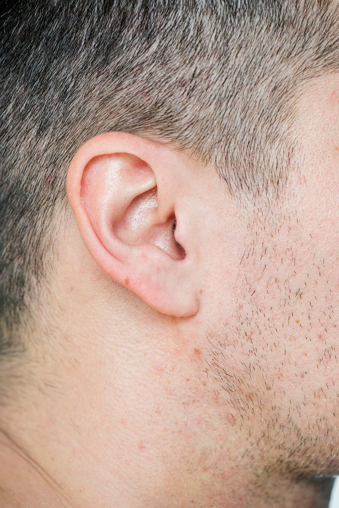 Closeup of white man's ear