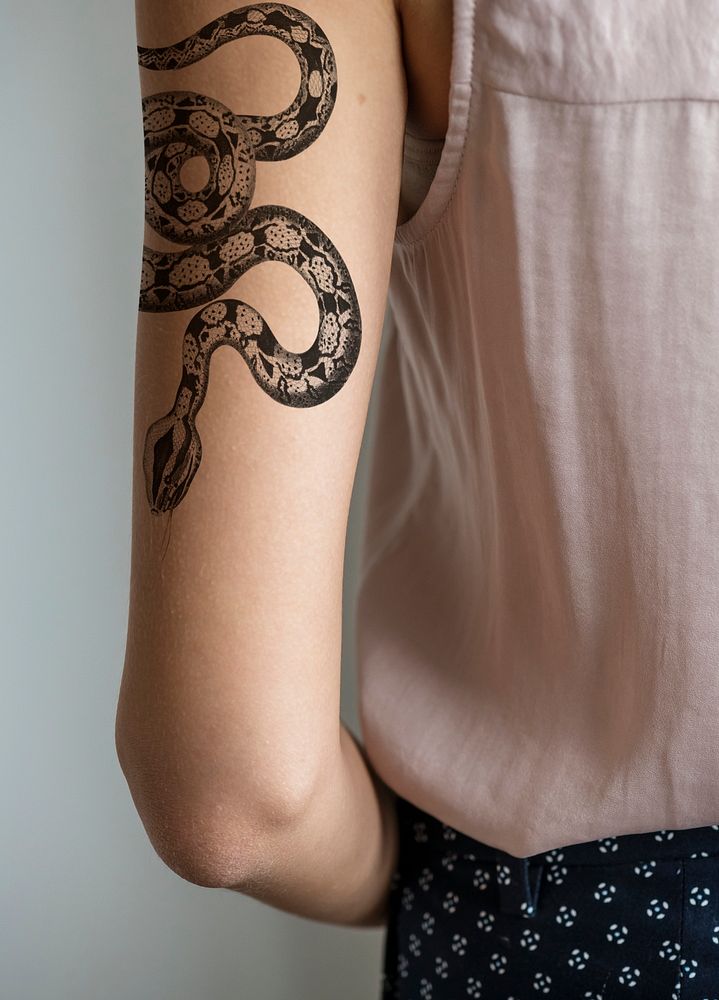 Closeup of tattooed arm of a woman