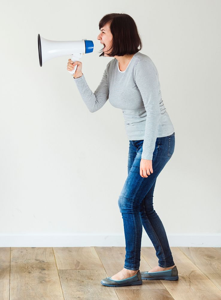 Woman using megaphone for annoucement