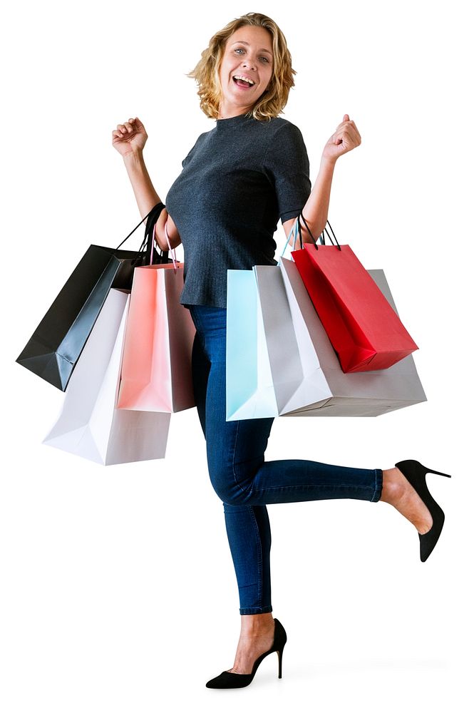 Woman showing shopping bags isolated