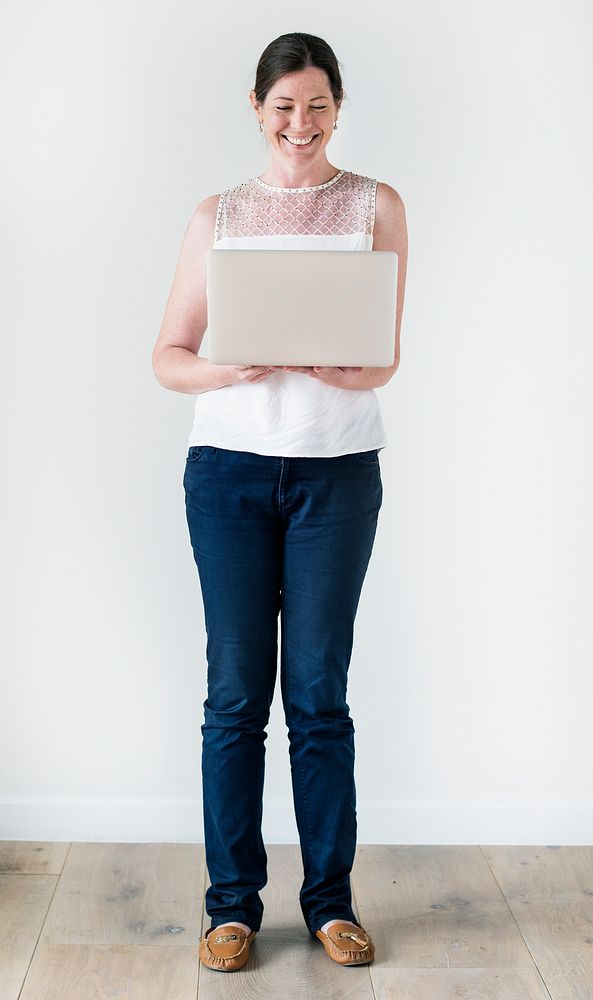 Woman using laptop isolated