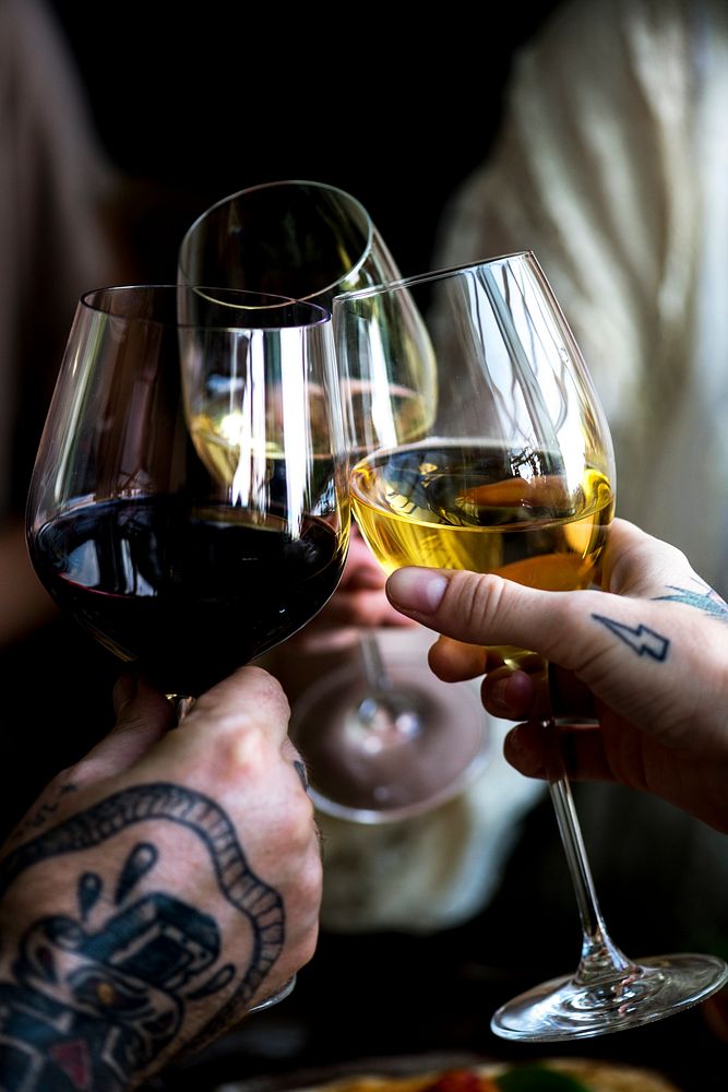 People cheering with glasses of wine Premium Photo rawpixel