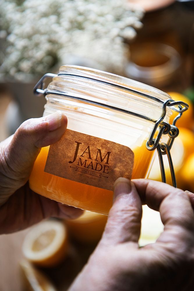 Putting a label on a jar of jam